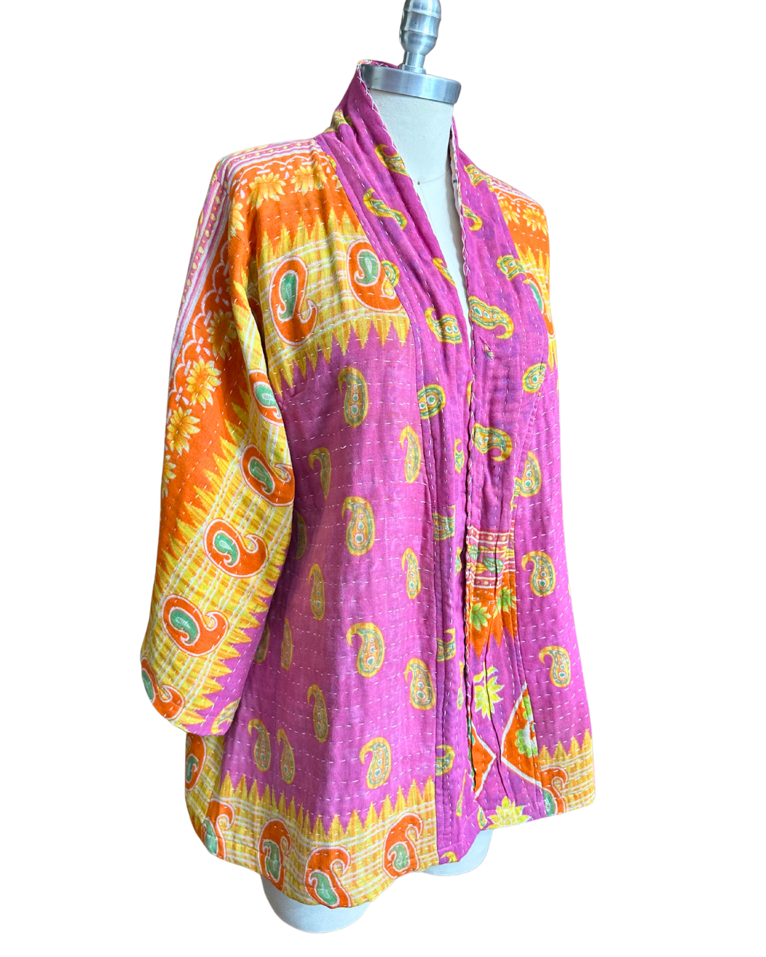 Upcycled Kantha kimono jacket from TheNickStitch, shown on a mannequin, featuring fuchsia & purple cotton sari fabric.
