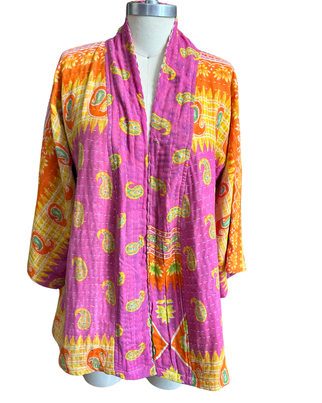 Upcycled Kantha kimono jacket from TheNickStitch, shown on a mannequin, featuring fuchsia & purple cotton sari fabric.
